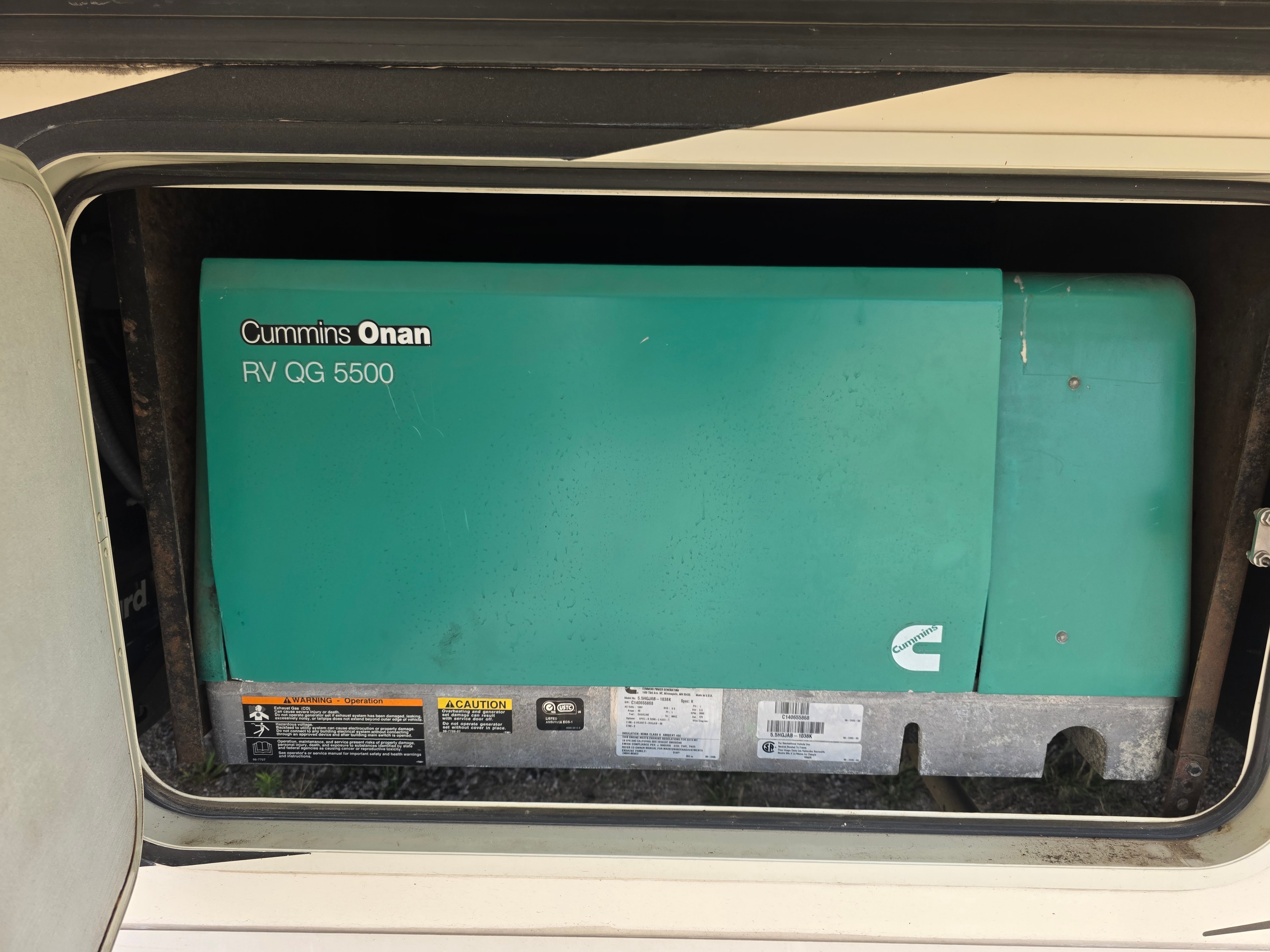 2014 Forest River Georgetown – Cummins Onan RV QG 5500 generator in storage bay