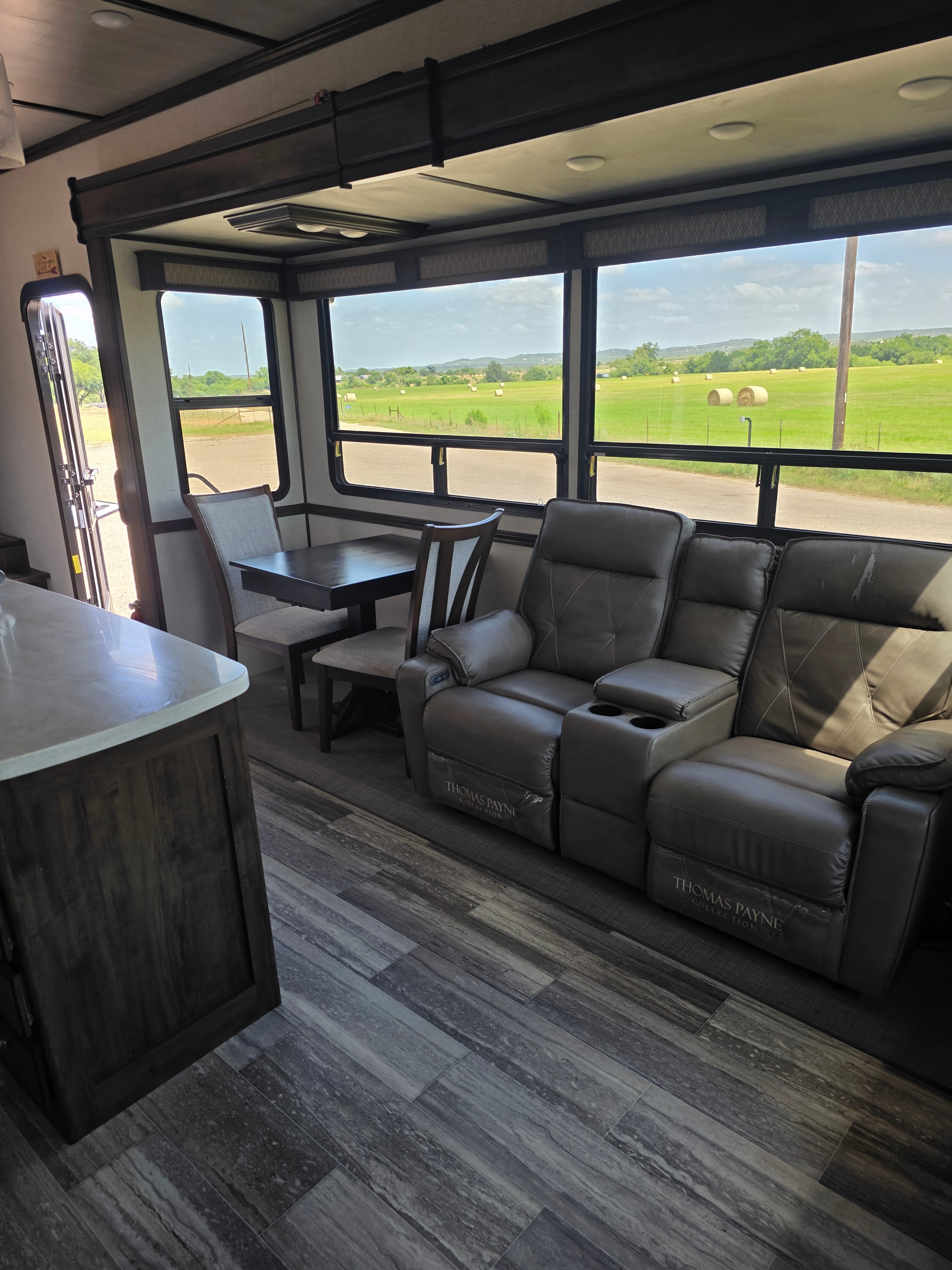 2021 Yukon Dutchmen 320RL – Thomas Payne theater seating with panoramic windows