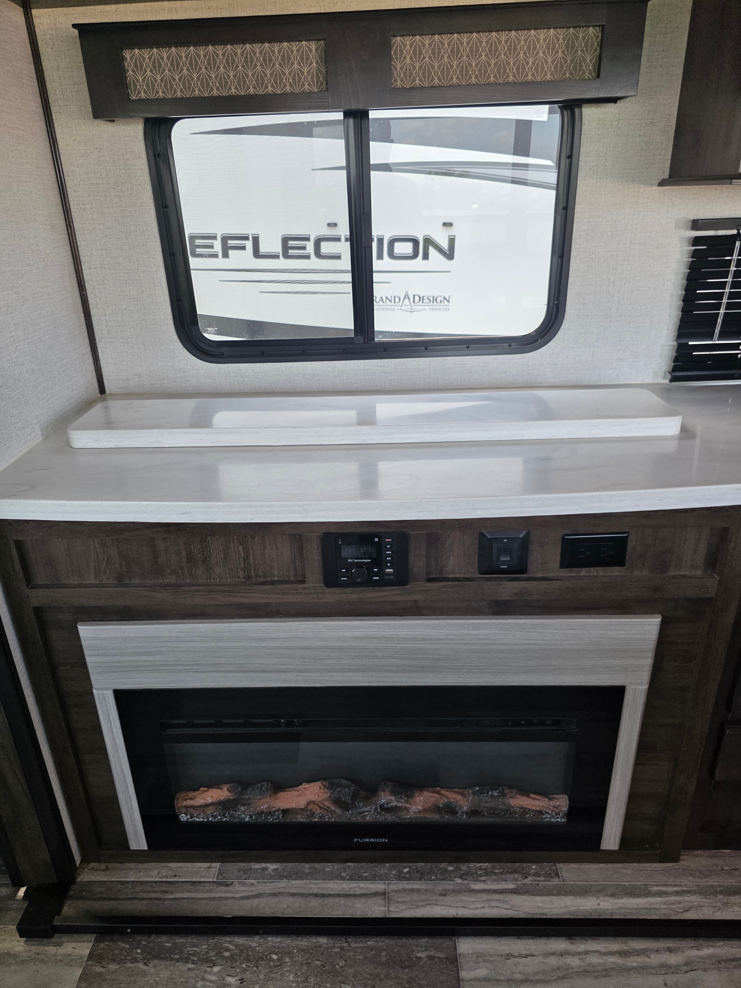 2021 Yukon Dutchmen 320RL – electric fireplace and entertainment center
