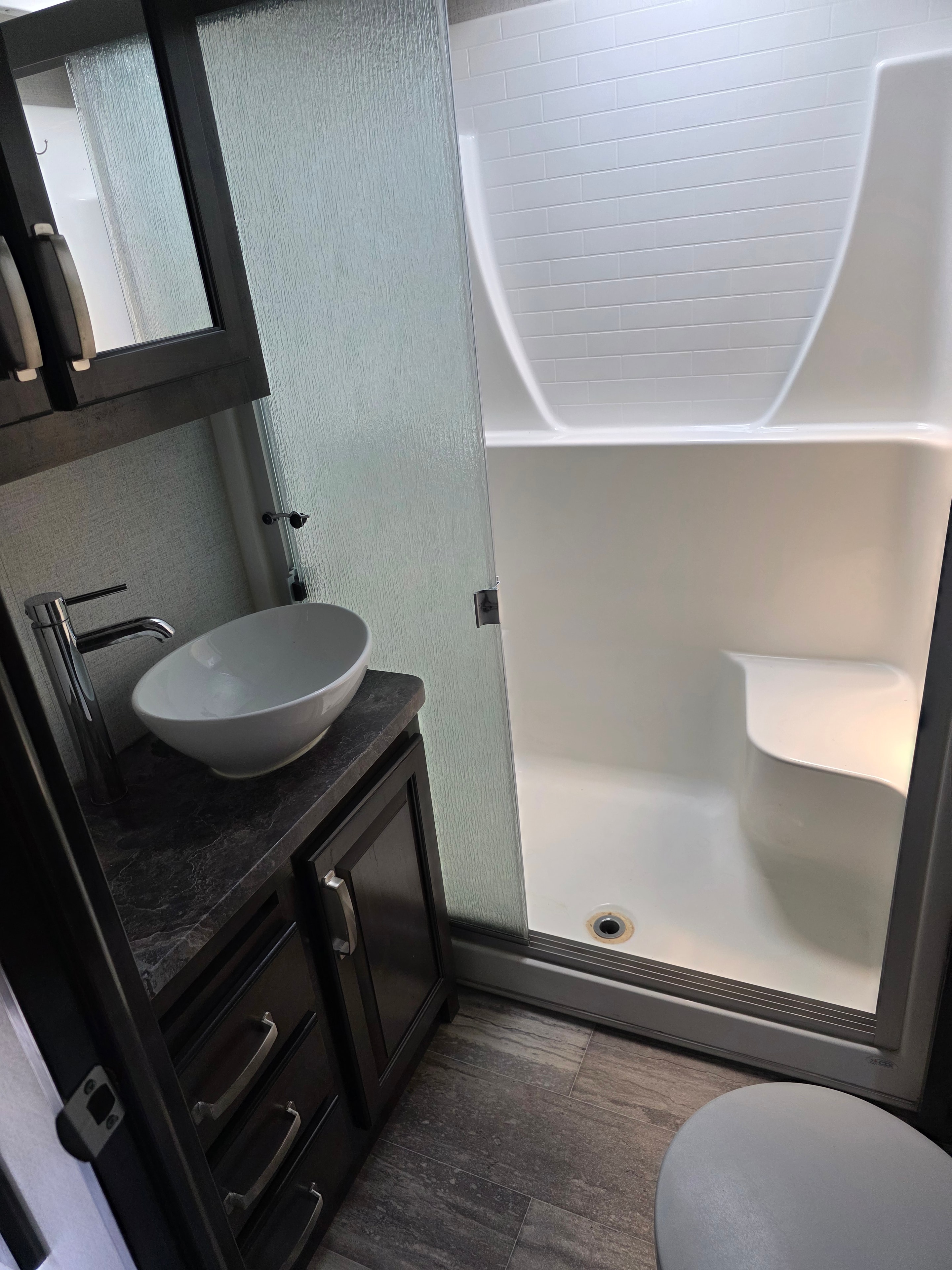 2021 Yukon Dutchmen 320RL – bathroom vanity with vessel sink and walk-in shower