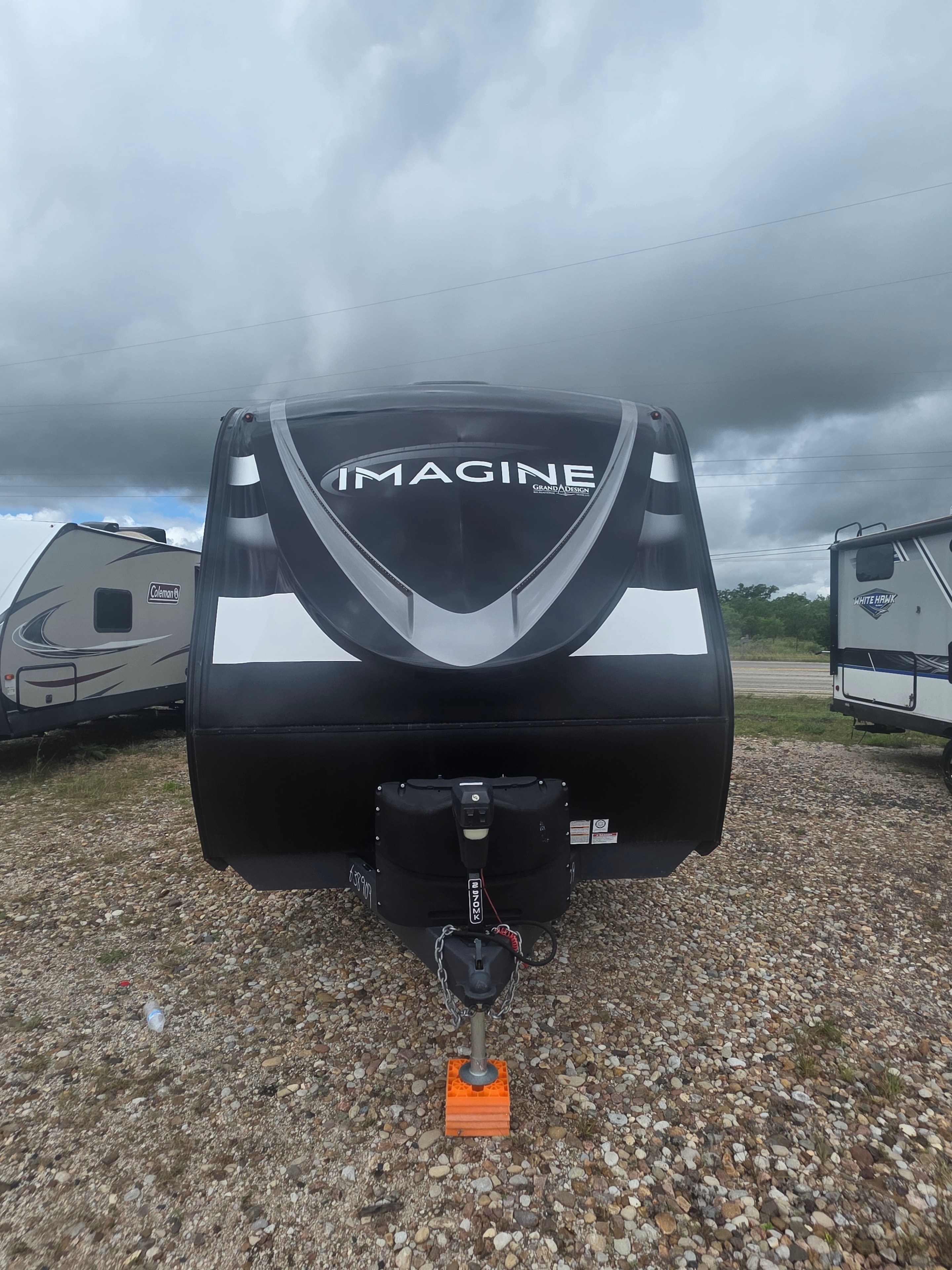 2022 Grand Design Imagine 2670MK – front cap close-up with Imagine Grand Design logo and power tongue jack