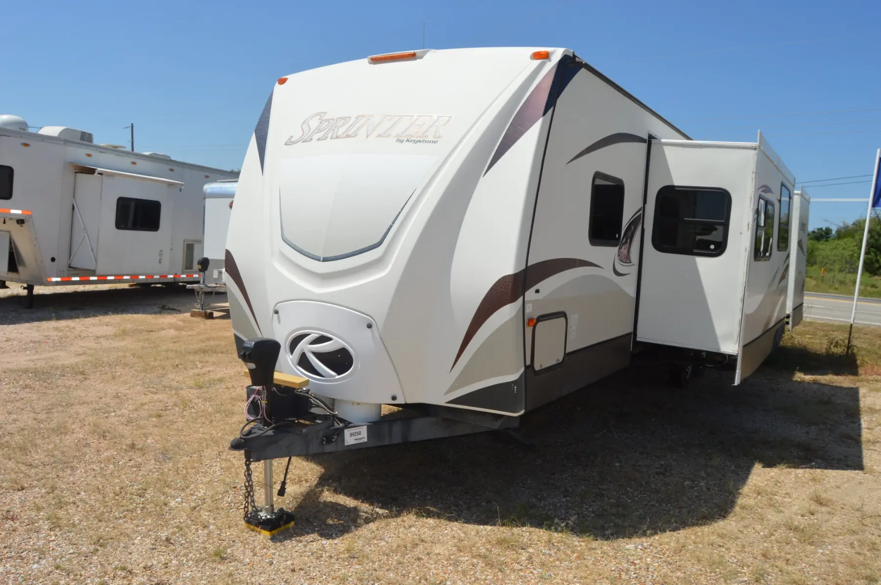 2013 Keystone Sprinter 311BHS travel trailer exterior front view